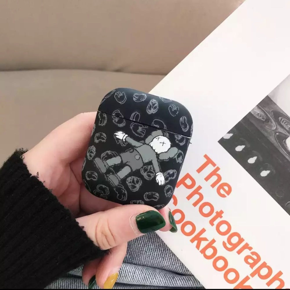 Kaws Apple Airpods case (glows in the dark)